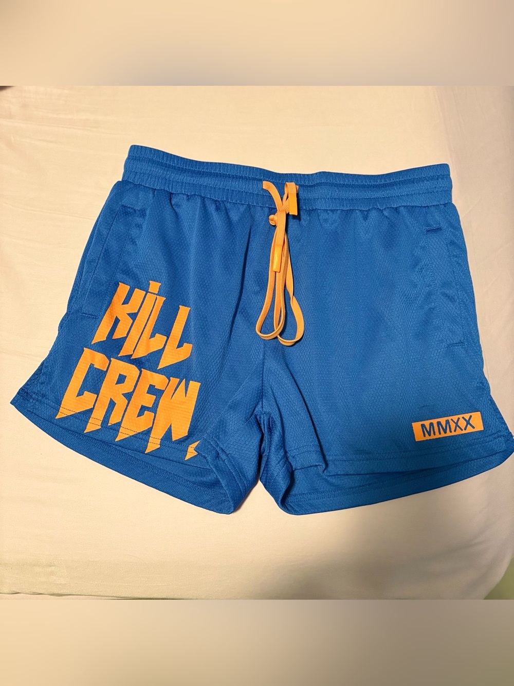 Kill Crew Blue Athletic Shorts with Orange Graphics
